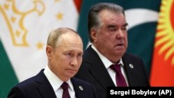 Russian President Vladimir Putin (left) and Tajik President Emomali Rahmon arrive to attend the Shanghai Cooperation Organization summit in Samarkand, Uzbekistan, in September 2022.