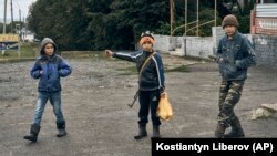 Діти на вулицях Куп’янська, вересень 2022 року