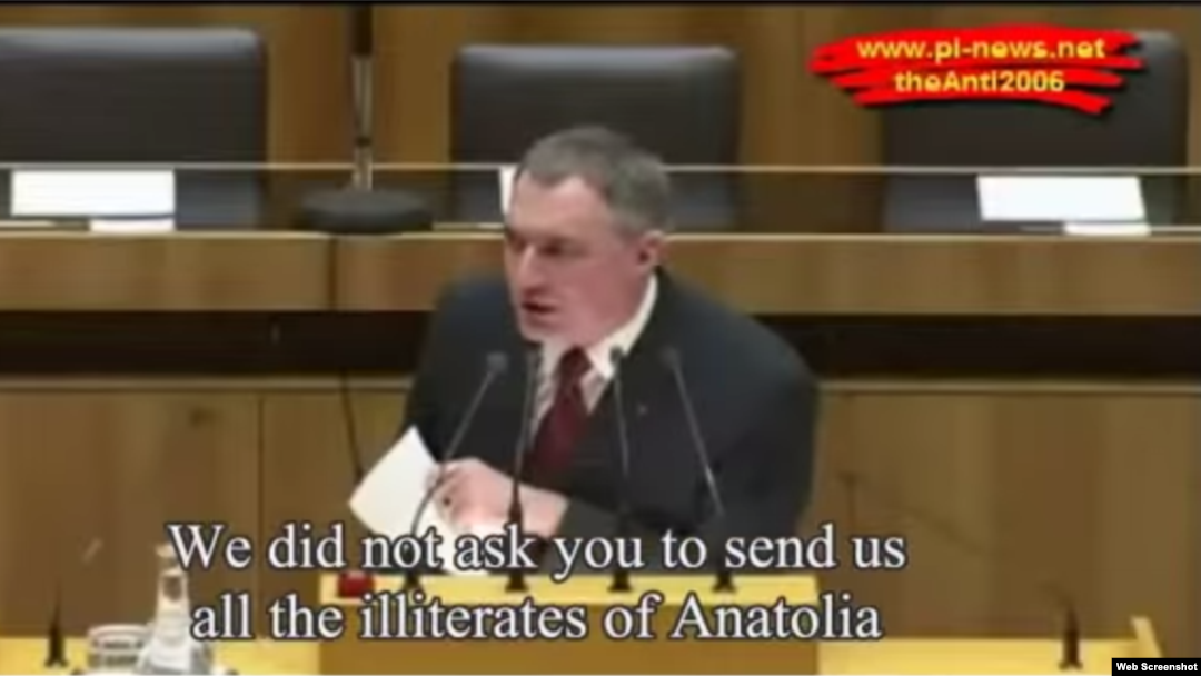 A screen grab from an infamous speech by far-right politician Ewald Stadler to the Austrian parliament in 2010. 