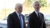 NATO Secretary-General Jens Stoltenberg (right) welcomes U.S. President Donald Trump upon his arrival for the NATO summit in Brussels on May 25.