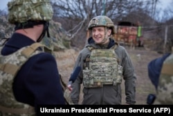Ukrainian President Volodymyr Zelenskiy visits the front line in the Mariupol region on April 9.