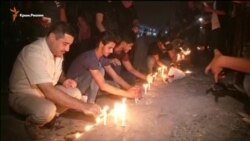 В Багдаде почтили память жертв взрывов смертников (видео)