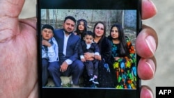 تصویر اعضای یک خانواده کرد عراقی که بر اثر واژگونی قایق در منطقه کالابریا ایتالیا جان باختند