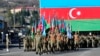 Azerbaijani troops march during a military parade in Khankendi, known by Armenians as Stepanakert, in Nagorno-Karabakh, on November 8. 