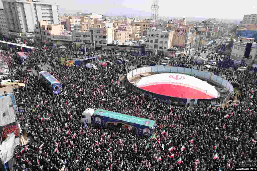 Mourners gather in central Tehran on March 18 during the funeral of Ali Larijani. The Iranian security chief was killed in an Israeli strike on March 17.