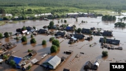 Затопленное село в Иркутской области, Сибирь, Россия, 26 июня 2019 года