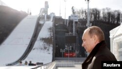 Russian President Vladimir Putin visits the RusSki Gorki Jumping Center at the Krasnaya Polyana resort near the Black Sea city of Sochi on February 6.