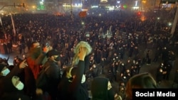 Protesters take to the streets in Tehran in opposition to the Iranian rulers.