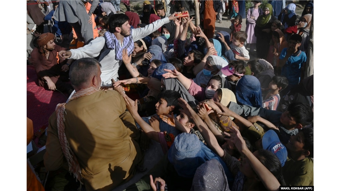 Fleeing Fighting, Afghans Flood Into Kabul And Gather At Pakistan Border