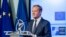 FILE - In this July 10, 2018, file photo, European Council President Donald Tusk addresses the media after the signature of the second EU NATO Joint Declaration, in Brussels. The senior European Union official on Monday, July 16, 2018, urged President Do