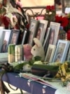 North Macedonia - Kocani - photos of victims during funeral ceremony for victims of fire at Pulse nightclub - screengrab 3