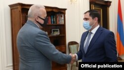 Armenia - Deputy Prime Minister Suren Papikian (R) meets with Russian Ambassador Sergei Kopyrkin, Yerevan, September 23, 2021.