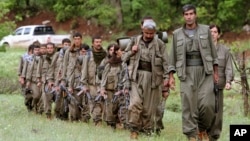 Un grup de luptători kurzi în nordul Irakului, într-o imagine din 2013. Kurzii sunt una din cele mai mari populații fără stat propriu din lume, și se plâng de discriminare în Turcia, mai ales.