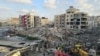 First responders gather at the site of an Israeli strike in the southern Lebanese city of Tyre on June 1.