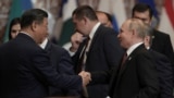Глава Китая Си Цзиньпин (слева) и президент России Владимир Путин на саммите ШОС в Астане. 4 июля 2024 года