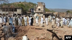 The site of the suicide car-bomb blast near the garrison city of Kohat