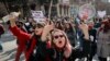 KOSOVO -- Kosovar women take part in a march to mark International Women's Day in Pristina, March 8, 2021