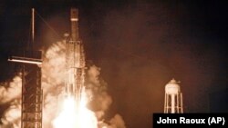 SpaceX компаниясының Falcon 9 зымыраны ғарышқа ұшырылған сәт. Көрнекі сурет.