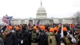 USA-TRUMP/CAPITOL-ARRESTS / Members of the far-right group Proud Boys make 'OK' hand gestures indicating "white power"