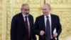 Russia - Armenian Prime Minister Nikol Pashinyan and Russian President Vladimir Putin speak during a CIS summit at the Kremlin in Moscow, October 8, 2024.