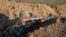 Nagorno-Karabakh - An Armenian soldier shoots during a military exercise, 20Nov2015.