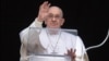 Pope Francis leads the Angelus prayer from his window at the Vatican on March 10.
