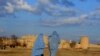 Afghanistan -- Two burqa-clad Afghan women walk on the outskirts of Herat, January 22, 2013