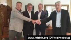 Milorad Dodik (left), Lars-Gunnar Wigemark, Bakir Izetbegovic, and Dragan Covic in Sarajevo on August 5