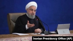 Iranian President Hassan Rohani speaking at a cabinet meeting in Tehran on December 2.