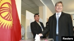 Former Kyrgyz Prime Minister Almazbek Atambaev casts his ballot during the presidential election on October 30, which he looked set to win. 