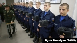 Russian conscripts depart from a recruiting station in St. Petersburg.