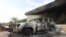 A burned car is seen in front of the U.S. Consulate in Benghazi, Libya, after it was attacked and set on fire by gunmen on September 11, 2012.