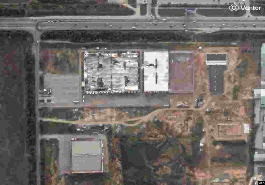 Handout satellite images from Vantor show a Wildberries warehouse in Simferopol, Russia, on July 22 and on August 4.