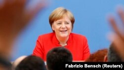 German Chancellor Angela Merkel speaks at her annual summer news conference in Berlin on July 20.