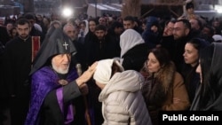 Armenia - Catholicos Garegin II blesses worshippers outside the Echmiadzin cathedral of the Armenian Apostolic Church, January 5, 2025.