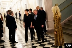 Danish Foreign Minister Lars Loekke Rasmussen (center right), and Greenland's minister for foreign affairs, Vivian Motzfeldt (center left), arrive to meet with the US Vice President, JD Vance, and Secretary of State Marco Rubio at the White House on January 14.