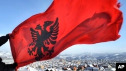 Serbia's football association asked for the Kosovar journalist's removal, saying that he provoked Serbian fans by making a gesture with his hands that mimics the double-headed eagle on Albania's national flag. (file photo)