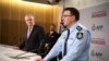 Комисарят на Австралийската федерална полиция Рийс Кършоу и премиерът на Австралия Скот Морисън
