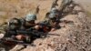 Afghan National Army soldiers attend a training session in Herat on September 24.