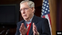 U.S. Senate Republican leader Mitch McConnell talks to reporters on December 12. 