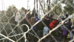 Migrants Break Through Greek-Macedonia Border