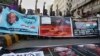 Angry Islamists chant slogans at a demonstration against the independent Pakistani newspaper Dawn outside the Press Club in Karachi on December 3.