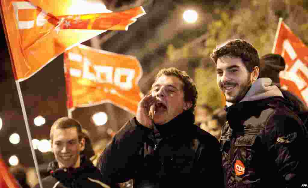 Spanish strikers gather in the parking lot of the Madrid Bus Company.