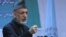 Afghan President Hamid Karzai speaks during a gathering in Kabul on April 17.