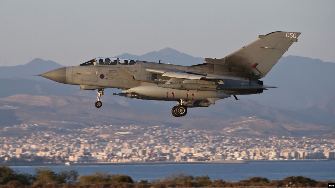 A handout picture provided by the British Ministry of Defense shows a Royal Air Force (RAF) Tornado GR4 returning from an armed mission in support of operation "Shader" in Iraq, to the RAF station in Akrotiri, Cyprus, on September 30.