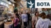 TOPSHOT - People walk along an alley at the Tajrish Bazaar in Tehran on June 2, 2026.