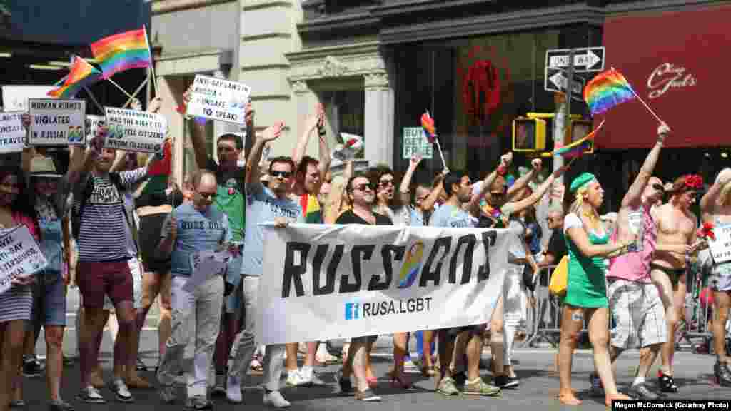 As the parade began, organizer Yelena Goltsman gathered the group and shouted, &quot;Let&#39;s show &#39;em the Russian are coming! They&#39;re here!&quot;