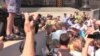 Мітинг проти підвищення тарифів під Кабміном закінчився сутичками (відео)