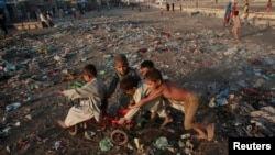 Pakistan -- Children play in a slum area of Karachi, 17Nov2008