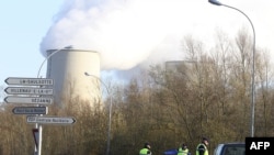 French police stop motorists at the nuclear plant in Nogent-sur-Seine, southeast of Paris.